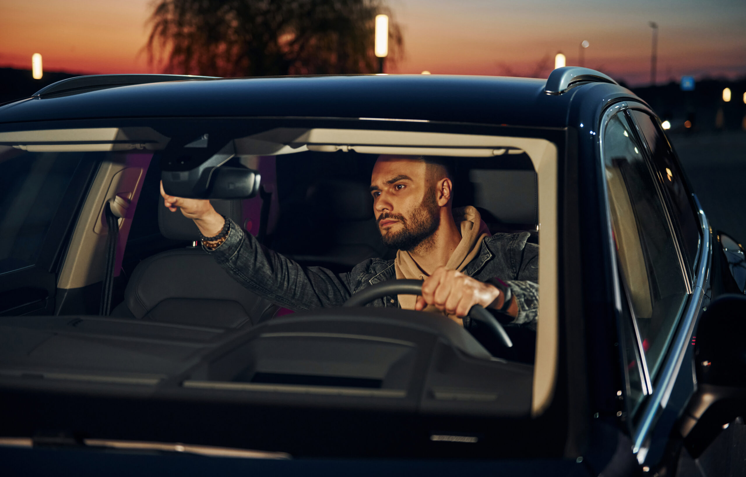 checking the car mirror